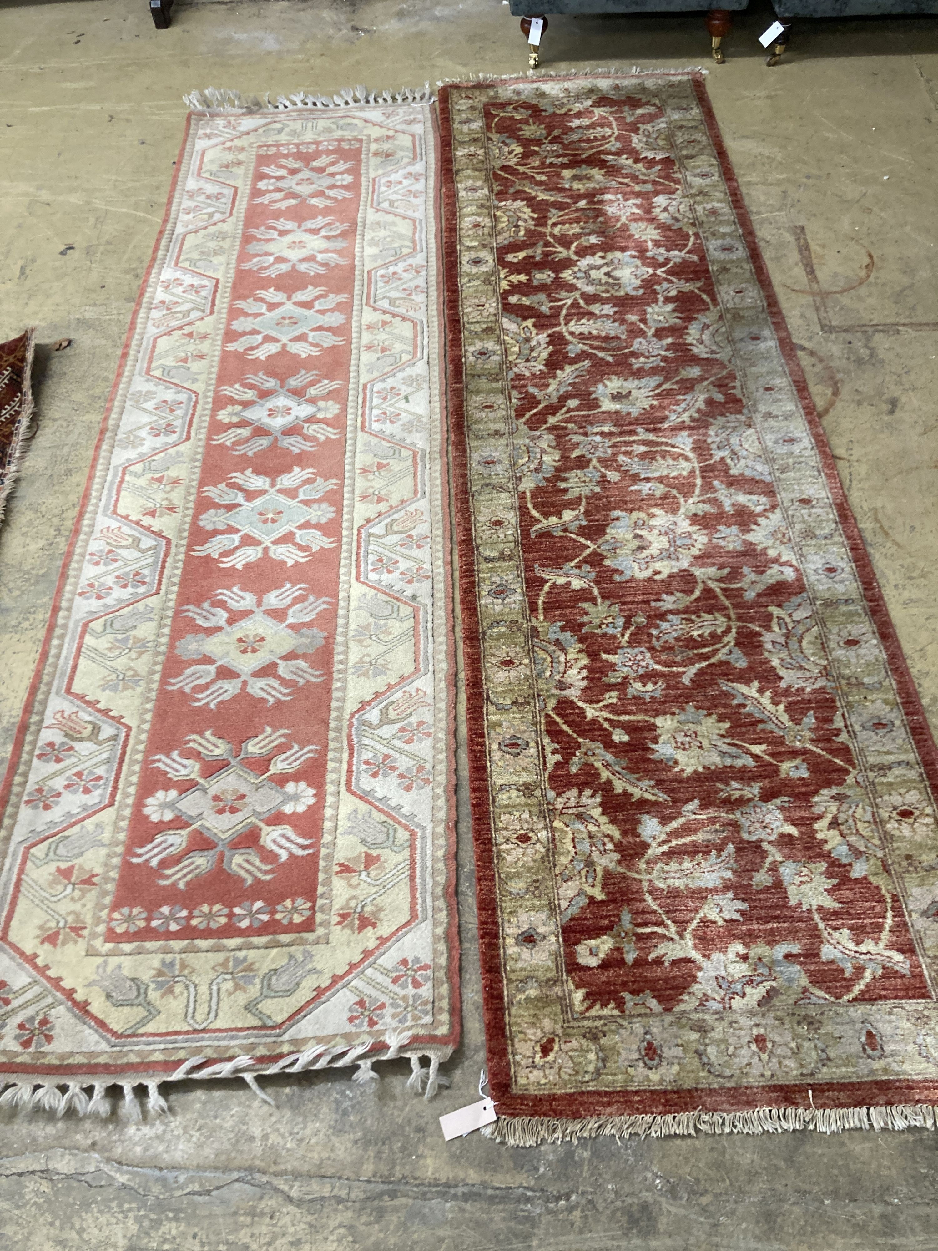 An Afghan Ziegler peach ground runner and another runner, largest 310 x 84cm